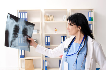 Female doctor radiologist working in the clinic 