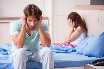 Young couple in the bedroom 