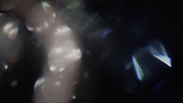 Traveling light beam in the dark. Natural organic reflections for use in creative projects.