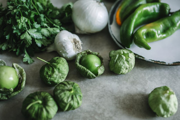 Fresh ingredients for green tomatillos salsa
