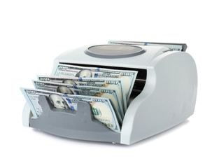 Modern electronic bill counter with money on white background