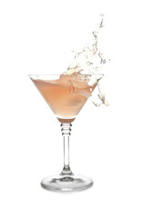 Glass of martini cocktail with splash on white background