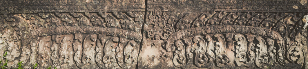 Bas-relief at Pre Rup temple. Siem Reap. Cambodia. Panorama