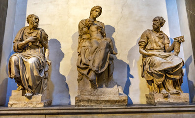 Fototapeta na wymiar Statues Lorenzo Tomb Chapel San Lorenzo Medici Church Florence Italy