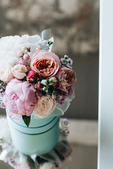 Beautiful spring bouquet with tender flowers in box