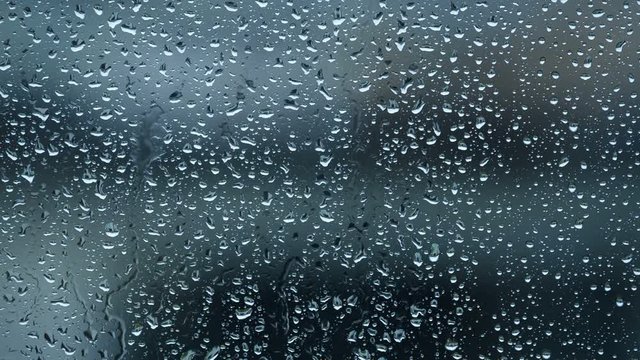 Rain water drops on a window close up