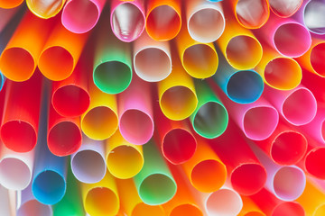 Close up to colorful straws background