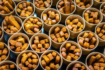 Crackers. Glasses Crackers in paper cups. Paper cups.
