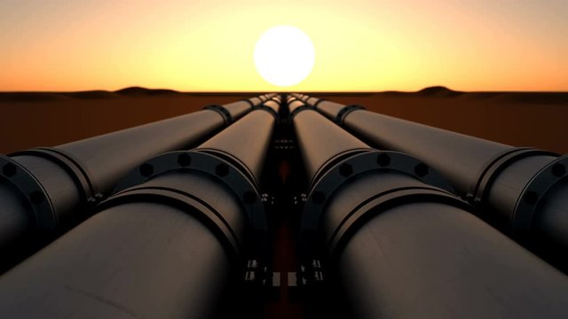 Pipeline transport oil, natural gas or water in a metal pipe. Oil concept. Looped animation of camera movement over the oil pipeline right at sunset