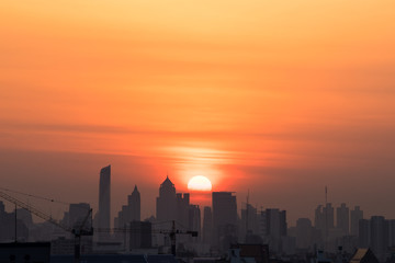 Fototapeta na wymiar Air pollution covers the city at sunrise timing