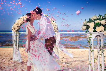 Wedding couple just married at the beach, Bali