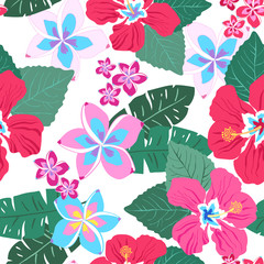 Tropical seamless repeat pattern with red and hot pink hibiscus and frangipani plumeria flowers and green leaves