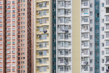 Fototapeta na wymiar exterior of colorful high rise residential building in Hong Kong city