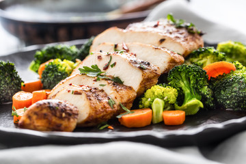 Roasted chicken breast with broccoli carrot and sesame