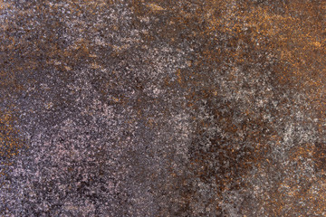 Brown eroded metal textured background