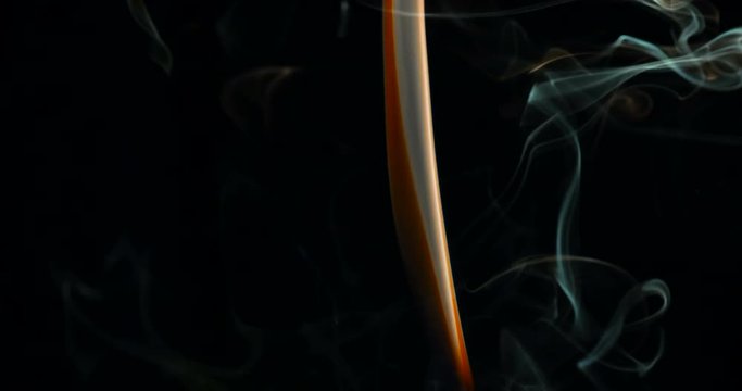 Hot Flexible Smoke Jet. A thin stream of smoke curls into bizarre shapes and fills the space. Filmed at a speed of 120fps