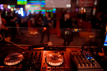 Fototapeta na wymiar DJ console at the nightclub. Nightlife