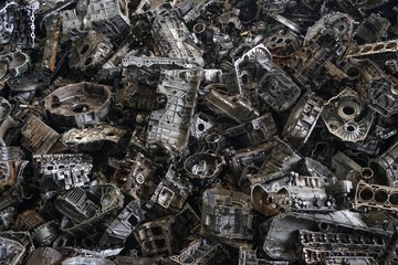 Engine junkyard, cracked engine block, aluminum for recycling.