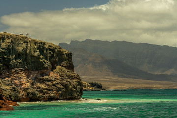 Wild and rugged volcanic coast near Punta Jandia, Fuerteventura, Canary Islands