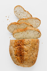 Loaf bread slices bread white background top view