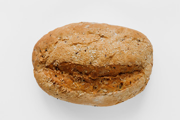 Whole loaf crispy bread white background top view