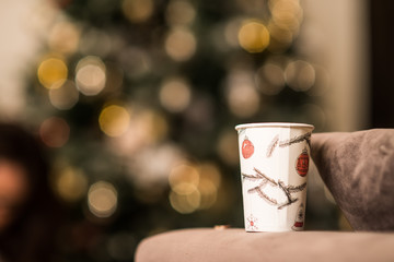 Takeaway drink in a cup and blurred background