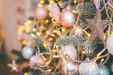 Closeup shot of the pastel Christmas tree decorations