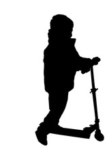 Silhouette of a boy rids scooter