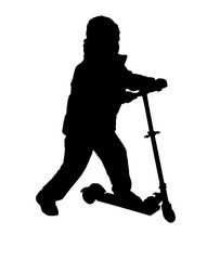 Silhouette of a boy rids scooter