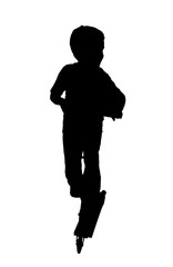 Silhouette of a boy rids scooter