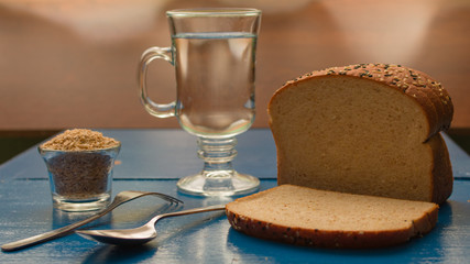 glass of milk and cookies on wooden table