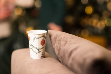 Takeaway drink in a cup and blurred background