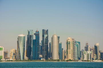 Futuristic urban skyline of Doha, largest city of the Arab state of Qatar