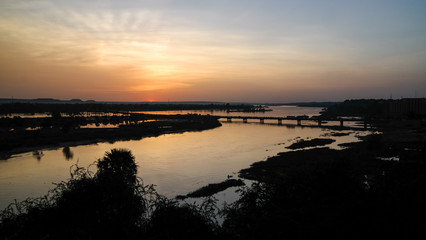 Naklejka na ściany i meble Aerial view to Niger river in Niamey at sunset Niger