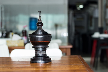 Burmese black kantok, blurred background