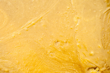 Yellow texture of the Jaggery paste