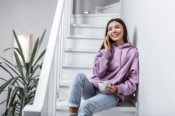 Beautiful woman smiling while receiving call from her boyfriend