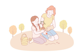 Family planting tree together