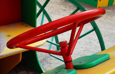 toy red metal steering wheel