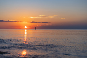 (石垣島)夕焼けの海と船