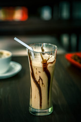 cold coffee recipe on wooden background