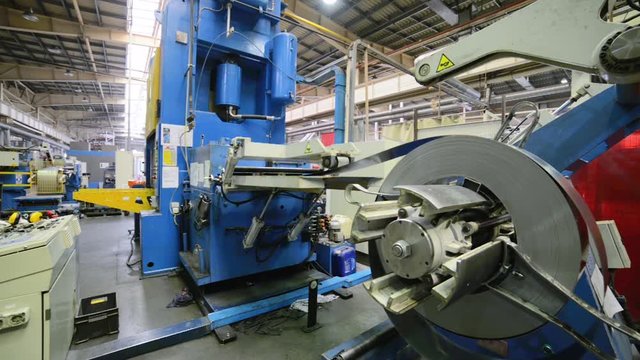 Roller forming machine. The interior of the plant producing a metal profile.
