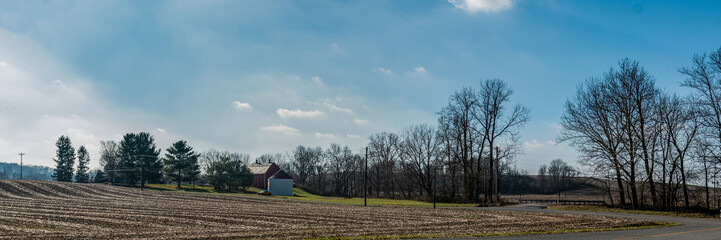 Rural countryside harvested corn field and barn banner