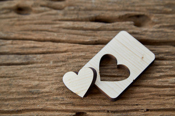 Wood heart Valentine on wooden