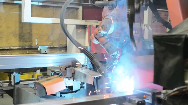Welding robot, the process of welding a metal profile.