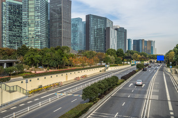 Fototapeta na wymiar Blurred urban traffic in city