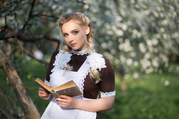 girl in a school uniform of the USSR