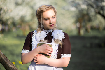 girl in a school uniform of the USSR