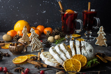 Traditional stollen and milled Hot wine cake and Christmas decorations
