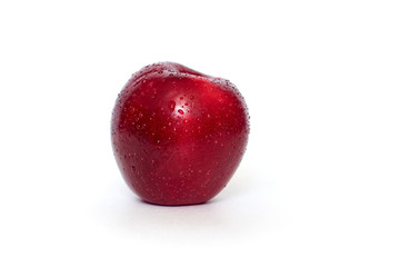 red apple in water drops isolated on a white background